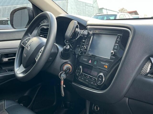 Серый Мицубиси Аутлендер, объемом двигателя 2.4 л и пробегом 183 тыс. км за 16590 $, фото 30 на Automoto.ua