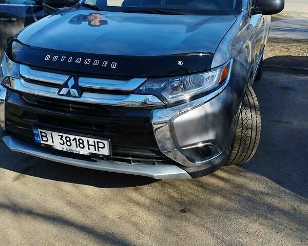 Серый Мицубиси Аутлендер, объемом двигателя 2.4 л и пробегом 65 тыс. км за 17000 $, фото 8 на Automoto.ua