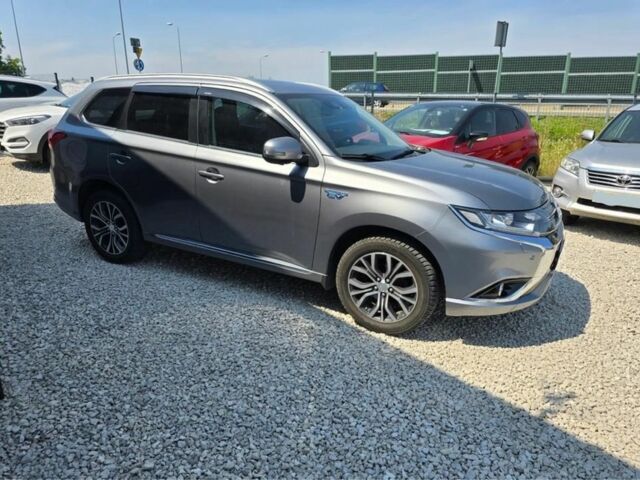 Серый Мицубиси Аутлендер, объемом двигателя 2.4 л и пробегом 89 тыс. км за 9900 $, фото 3 на Automoto.ua