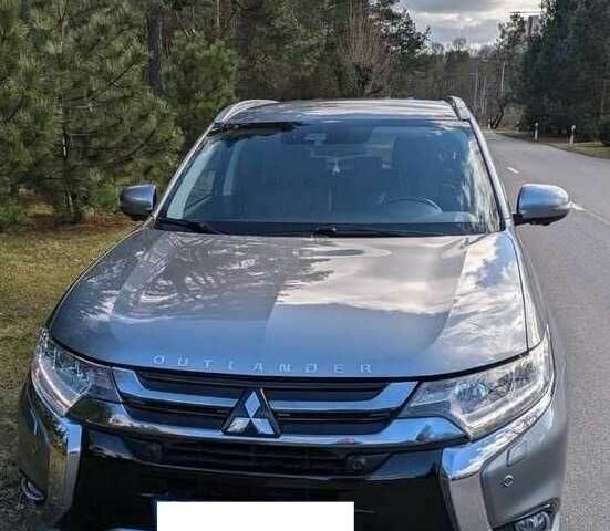 Серый Мицубиси Аутлендер, объемом двигателя 0 л и пробегом 115 тыс. км за 10500 $, фото 4 на Automoto.ua