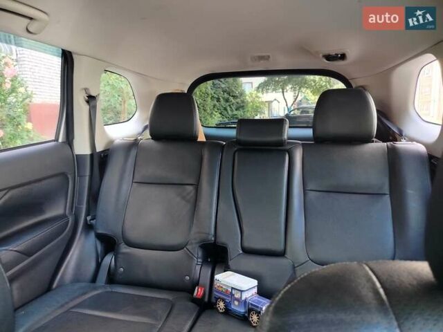 Сірий Міцубісі Аутлендер, об'ємом двигуна 2.4 л та пробігом 95 тис. км за 16800 $, фото 7 на Automoto.ua