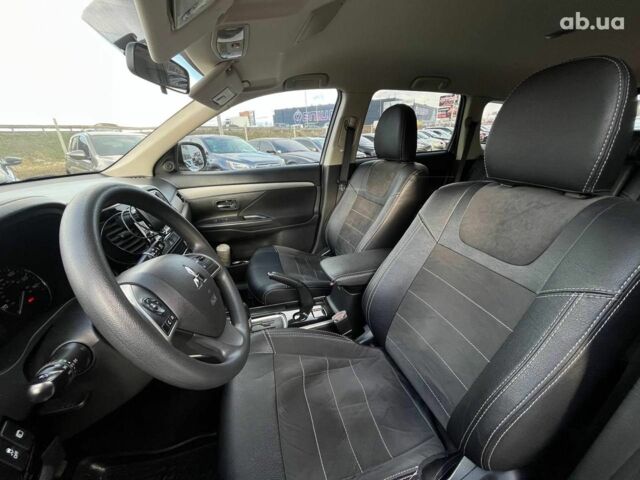 Серый Мицубиси Аутлендер, объемом двигателя 2.4 л и пробегом 183 тыс. км за 16590 $, фото 31 на Automoto.ua