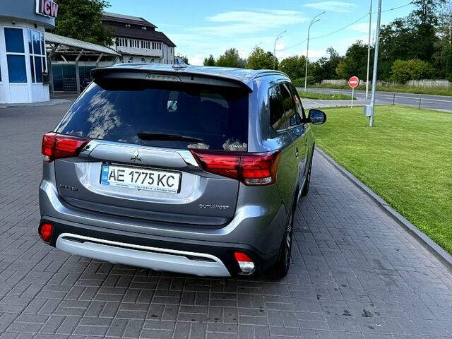 Серый Мицубиси Аутлендер, объемом двигателя 2.4 л и пробегом 139 тыс. км за 18900 $, фото 4 на Automoto.ua