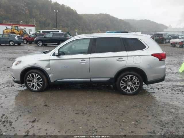 Сірий Міцубісі Аутлендер, об'ємом двигуна 2.4 л та пробігом 87 тис. км за 3000 $, фото 7 на Automoto.ua