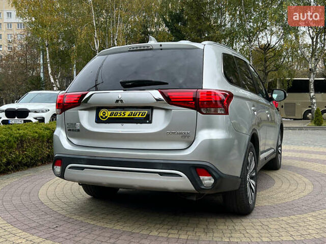 Сірий Міцубісі Аутлендер, об'ємом двигуна 3 л та пробігом 156 тис. км за 18500 $, фото 6 на Automoto.ua