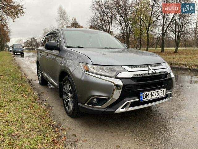 Серый Мицубиси Аутлендер, объемом двигателя 2.36 л и пробегом 150 тыс. км за 13500 $, фото 2 на Automoto.ua