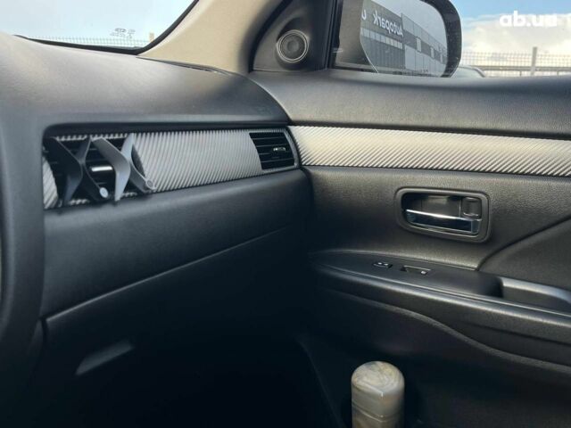 Серый Мицубиси Аутлендер, объемом двигателя 2.4 л и пробегом 183 тыс. км за 16590 $, фото 25 на Automoto.ua