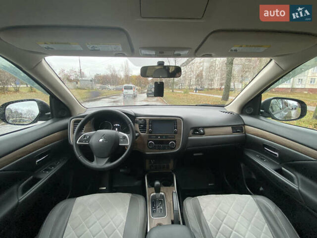 Серый Мицубиси Аутлендер, объемом двигателя 2.36 л и пробегом 150 тыс. км за 13500 $, фото 14 на Automoto.ua