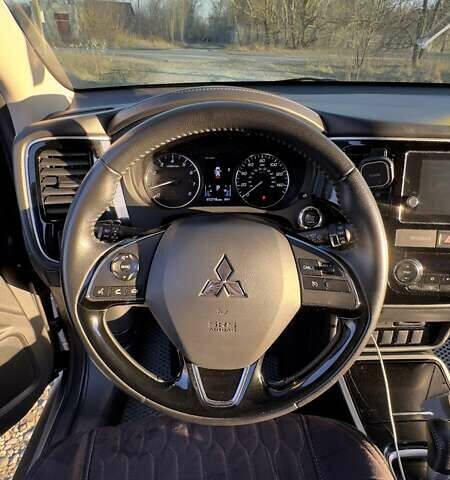 Сірий Міцубісі Аутлендер, об'ємом двигуна 2.36 л та пробігом 131 тис. км за 17200 $, фото 10 на Automoto.ua