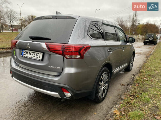 Серый Мицубиси Аутлендер, объемом двигателя 2.36 л и пробегом 150 тыс. км за 13500 $, фото 7 на Automoto.ua