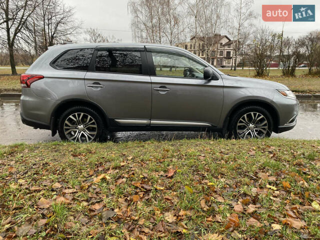 Серый Мицубиси Аутлендер, объемом двигателя 2.36 л и пробегом 150 тыс. км за 13500 $, фото 8 на Automoto.ua