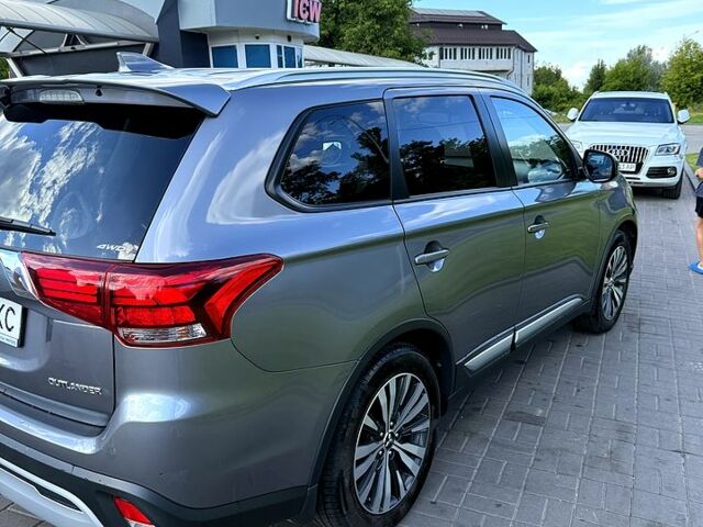 Серый Мицубиси Аутлендер, объемом двигателя 2.4 л и пробегом 139 тыс. км за 18900 $, фото 3 на Automoto.ua