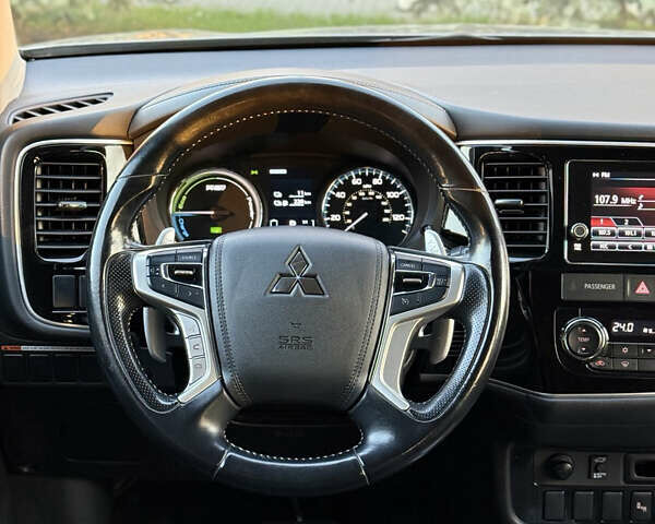 Серый Мицубиси Аутлендер, объемом двигателя 2 л и пробегом 107 тыс. км за 20900 $, фото 26 на Automoto.ua