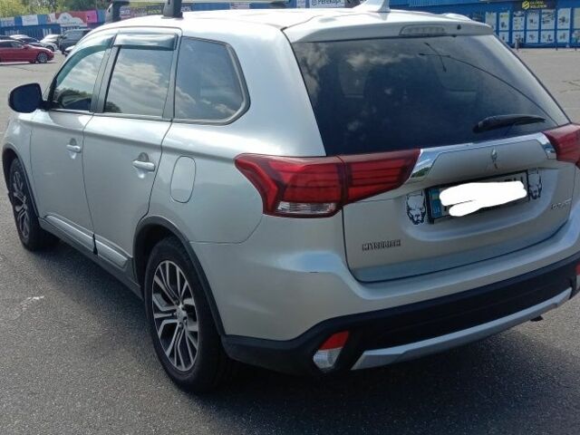 Серый Мицубиси Аутлендер, объемом двигателя 2.4 л и пробегом 100 тыс. км за 17700 $, фото 2 на Automoto.ua