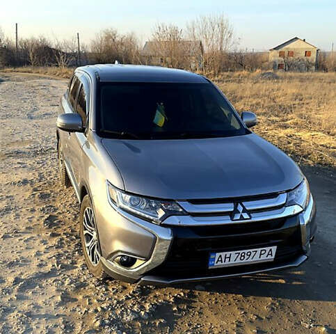 Серый Мицубиси Аутлендер, объемом двигателя 2.36 л и пробегом 131 тыс. км за 16300 $, фото 1 на Automoto.ua