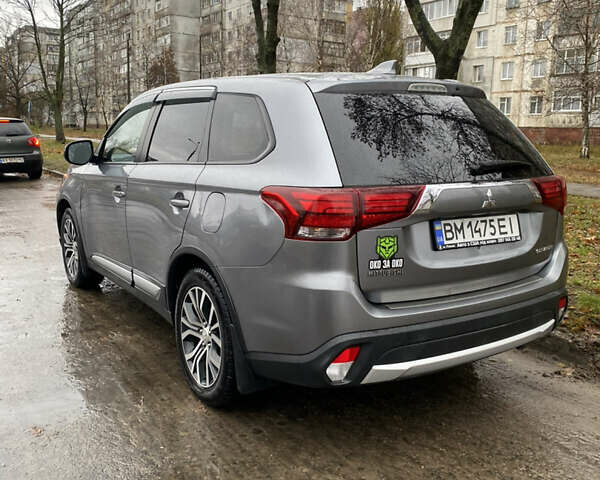 Серый Мицубиси Аутлендер, объемом двигателя 2.36 л и пробегом 150 тыс. км за 13500 $, фото 4 на Automoto.ua