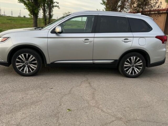 Сірий Міцубісі Аутлендер, об'ємом двигуна 2.36 л та пробігом 110 тис. км за 16000 $, фото 8 на Automoto.ua