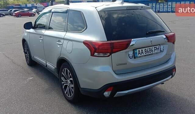 Сірий Міцубісі Аутлендер, об'ємом двигуна 2.36 л та пробігом 100 тис. км за 17700 $, фото 4 на Automoto.ua