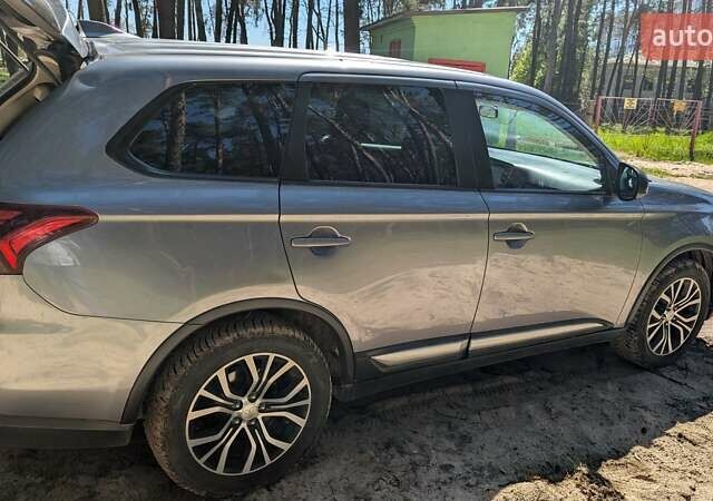 Сірий Міцубісі Аутлендер, об'ємом двигуна 2.36 л та пробігом 252 тис. км за 16000 $, фото 2 на Automoto.ua