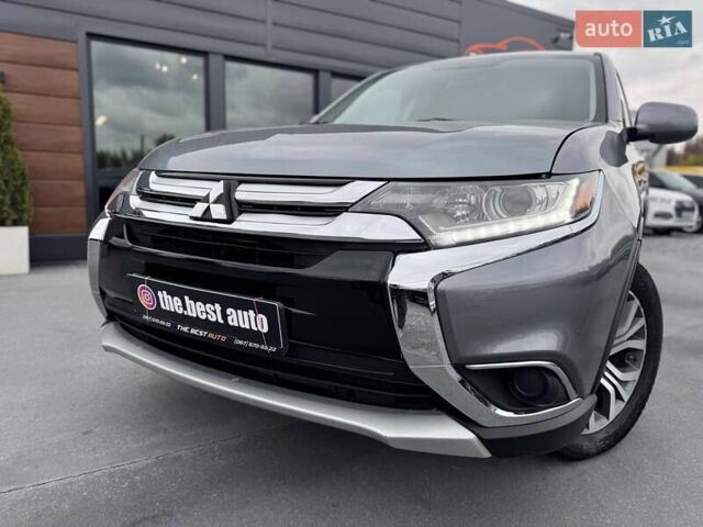 Серый Мицубиси Аутлендер, объемом двигателя 2.4 л и пробегом 103 тыс. км за 15497 $, фото 1 на Automoto.ua