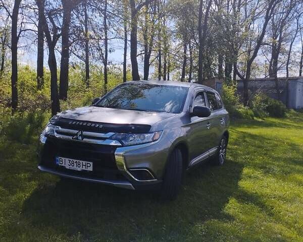 Серый Мицубиси Аутлендер, объемом двигателя 2.4 л и пробегом 65 тыс. км за 17000 $, фото 6 на Automoto.ua