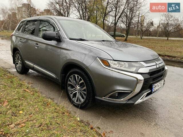 Серый Мицубиси Аутлендер, объемом двигателя 2.36 л и пробегом 150 тыс. км за 13500 $, фото 6 на Automoto.ua