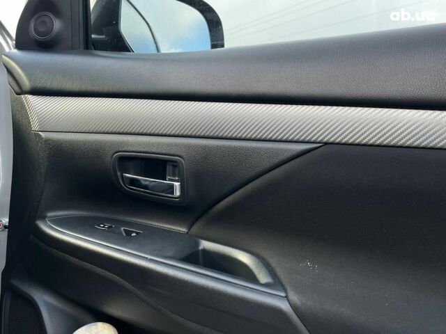 Серый Мицубиси Аутлендер, объемом двигателя 2.4 л и пробегом 183 тыс. км за 16590 $, фото 27 на Automoto.ua