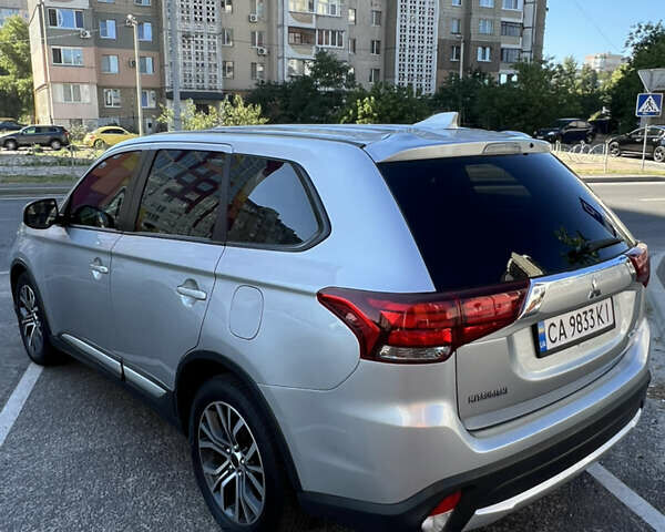 Серый Мицубиси Аутлендер, объемом двигателя 2.36 л и пробегом 139 тыс. км за 13600 $, фото 8 на Automoto.ua