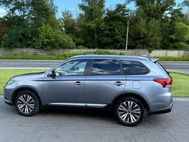 Серый Мицубиси Аутлендер, объемом двигателя 2.4 л и пробегом 139 тыс. км за 18900 $, фото 6 на Automoto.ua