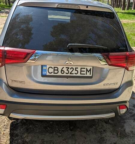 Сірий Міцубісі Аутлендер, об'ємом двигуна 2.36 л та пробігом 252 тис. км за 16000 $, фото 15 на Automoto.ua