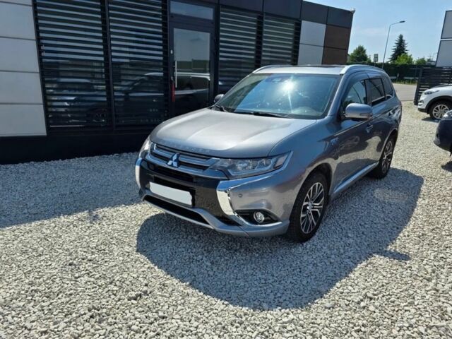 Серый Мицубиси Аутлендер, объемом двигателя 2.4 л и пробегом 89 тыс. км за 9900 $, фото 1 на Automoto.ua