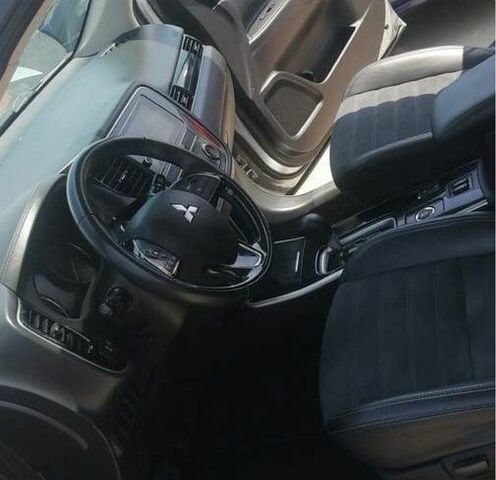 Серый Мицубиси Аутлендер, объемом двигателя 2.4 л и пробегом 91 тыс. км за 10599 $, фото 7 на Automoto.ua