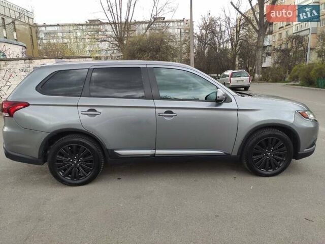 Сірий Міцубісі Аутлендер, об'ємом двигуна 2.36 л та пробігом 114 тис. км за 21000 $, фото 1 на Automoto.ua