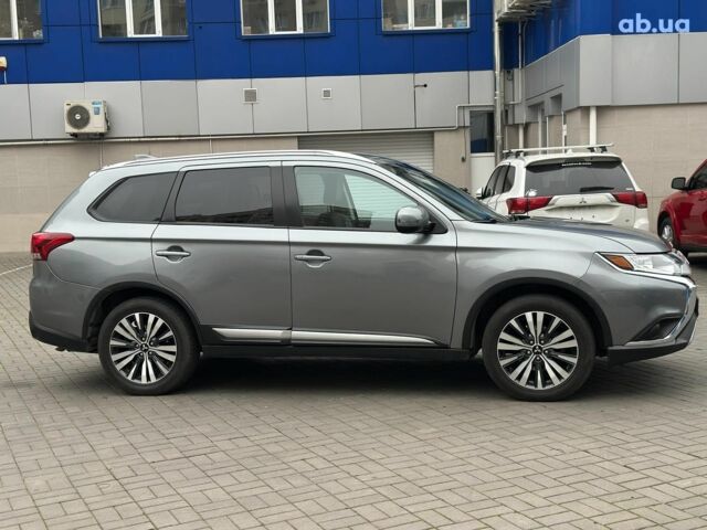 Серый Мицубиси Аутлендер, объемом двигателя 2.4 л и пробегом 131 тыс. км за 17440 $, фото 4 на Automoto.ua