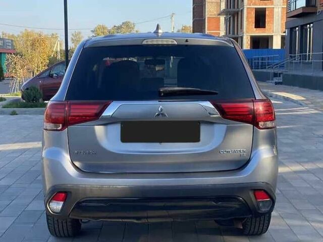 Сірий Міцубісі Аутлендер, об'ємом двигуна 2.4 л та пробігом 133 тис. км за 14000 $, фото 11 на Automoto.ua