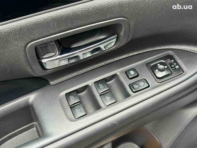 Серый Мицубиси Аутлендер, объемом двигателя 2.4 л и пробегом 131 тыс. км за 17440 $, фото 20 на Automoto.ua