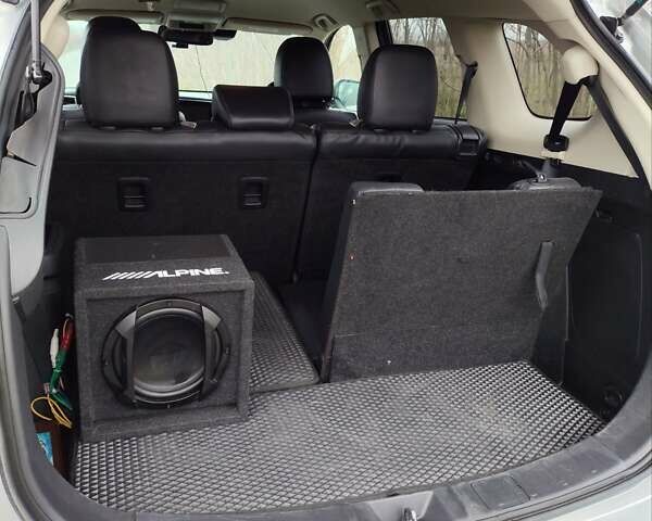 Серый Мицубиси Аутлендер, объемом двигателя 2.36 л и пробегом 101 тыс. км за 16400 $, фото 8 на Automoto.ua