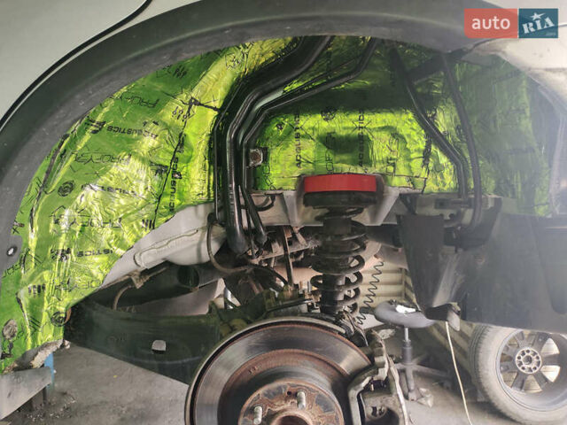 Серый Мицубиси Аутлендер, объемом двигателя 2.36 л и пробегом 135 тыс. км за 19200 $, фото 4 на Automoto.ua