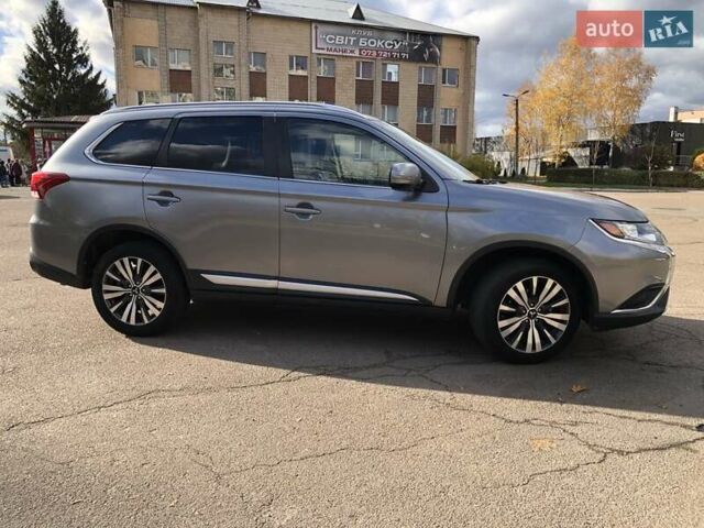 Серый Мицубиси Аутлендер, объемом двигателя 2.36 л и пробегом 155 тыс. км за 17500 $, фото 3 на Automoto.ua