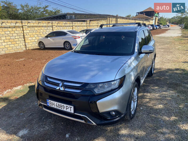 Серый Мицубиси Аутлендер, объемом двигателя 2.36 л и пробегом 135 тыс. км за 19200 $, фото 16 на Automoto.ua