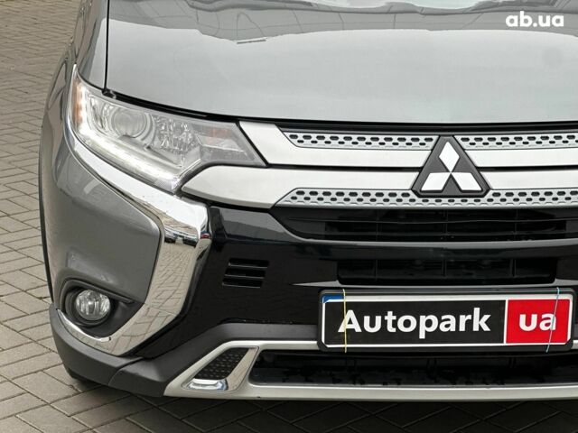 Серый Мицубиси Аутлендер, объемом двигателя 2.4 л и пробегом 131 тыс. км за 17440 $, фото 3 на Automoto.ua