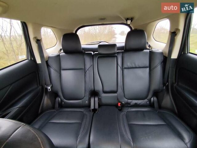 Серый Мицубиси Аутлендер, объемом двигателя 2.36 л и пробегом 101 тыс. км за 16400 $, фото 9 на Automoto.ua