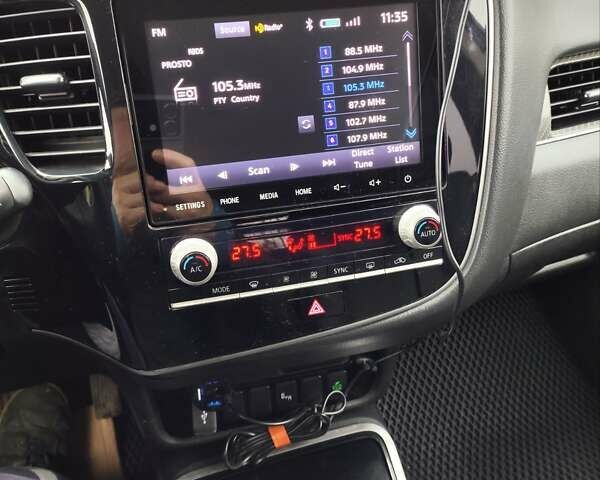 Серый Мицубиси Аутлендер, объемом двигателя 2.36 л и пробегом 101 тыс. км за 16400 $, фото 18 на Automoto.ua