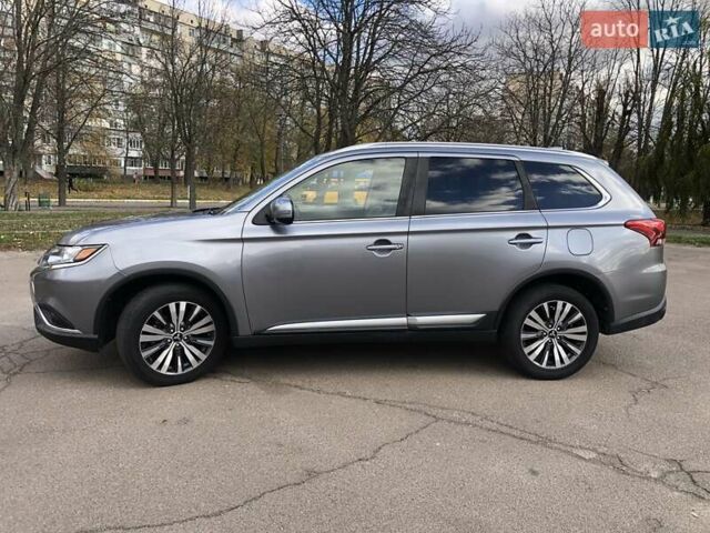 Серый Мицубиси Аутлендер, объемом двигателя 2.36 л и пробегом 155 тыс. км за 17500 $, фото 7 на Automoto.ua