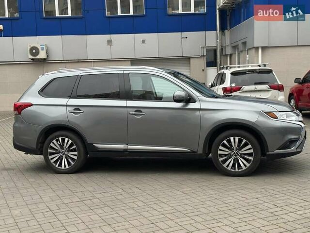 Сірий Міцубісі Аутлендер, об'ємом двигуна 2.4 л та пробігом 131 тис. км за 17440 $, фото 4 на Automoto.ua