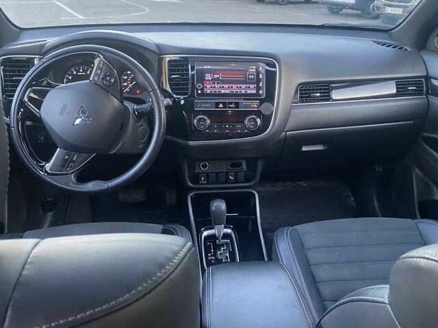 Серый Мицубиси Аутлендер, объемом двигателя 2.4 л и пробегом 93 тыс. км за 14600 $, фото 3 на Automoto.ua