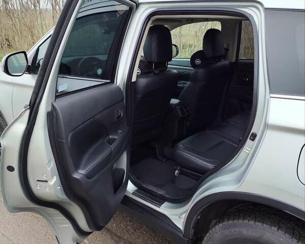 Серый Мицубиси Аутлендер, объемом двигателя 2.36 л и пробегом 101 тыс. км за 16400 $, фото 15 на Automoto.ua