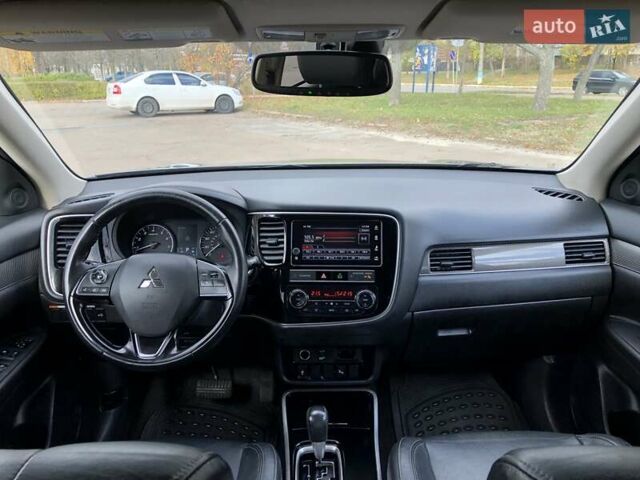 Серый Мицубиси Аутлендер, объемом двигателя 2.36 л и пробегом 155 тыс. км за 17500 $, фото 15 на Automoto.ua