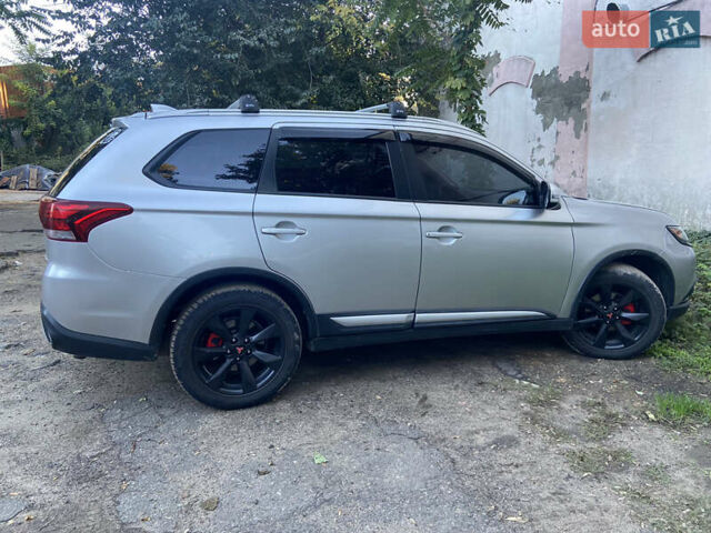 Серый Мицубиси Аутлендер, объемом двигателя 2.36 л и пробегом 135 тыс. км за 19200 $, фото 33 на Automoto.ua