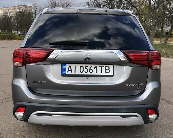 Серый Мицубиси Аутлендер, объемом двигателя 2.36 л и пробегом 155 тыс. км за 17500 $, фото 5 на Automoto.ua